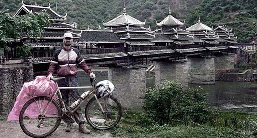 In front of the wind and rain covered bridge